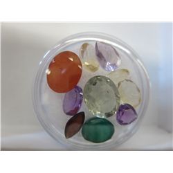 Collection of various loose cut gemstones