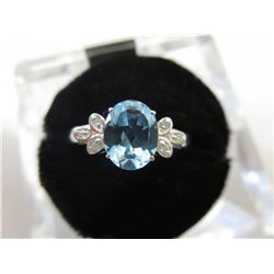 Oval cut 2.03 carat topaz ring