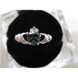 Claddagh ring in silver with hand cut mystic topaz