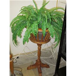 Wooden planter with a faux fern