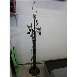 Floor lamp with metal bird & vine detail. No shade