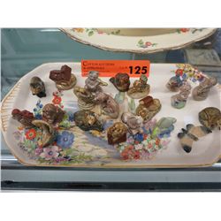 20 Wade figurines 1" tall on a vintage plate