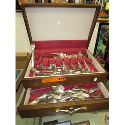 Flatware chest with large quantity of flatware