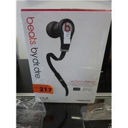 Beats by Dr. Dre Earbuds with control talk.