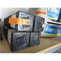 4 solar yard lights