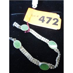 Vintage sterling bracelet with 4 green stones
