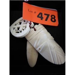 3 carved bone pendants