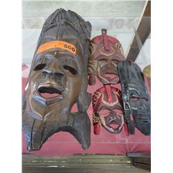 4 Carved decorative masks