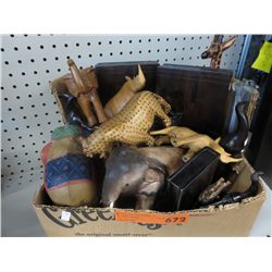 box of carved wood African themed animal figurines