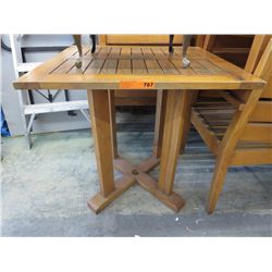 Teak patio table by Andrew Richard Designs