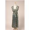 Image 1 : geoffrey beene TWO-pIEcE dress Comprised of a wrap-around sleeveless top and gathered skirt; the...