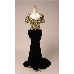 christian dior haute couture evening gown #27916 The floor-length black fitted net bodice has a d...