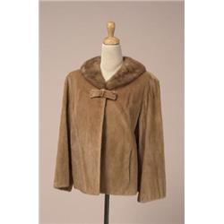 Vintage Eaton's pony and mink jacket The hip length light brown coloured pony coat has an attache...