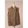 Image 1 : WOVEN MINK VEST The hip length vest with a mandarin collar is in caramel coloured sculpted mink w...