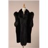 Image 1 : SHEARED MINK AND FOX VEST The body of the hip length vest is in black sheared mink, with black fo...