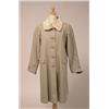 Image 1 : RAINCOAT WITH SHEARED RABBIT LINING AND TRIM The three-quarter length khaki coloured, water resis...