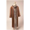 Image 1 : SATIN COAT WITH FOX TRIM AND RABBIT LINING The full length, copper coloured, water resistant sati...