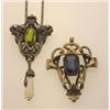 Image 1 : TWO ART NOUVEAU PENDANTS First, in base metal, a shield shape pendant with gryphon and grotesque...