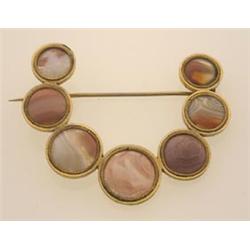 antique agate brooch The design is of seven round agate cabochons graduating in size from 10.5 to...