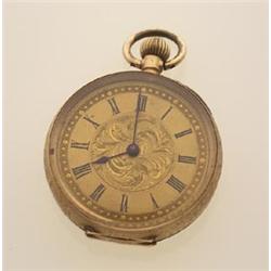 lady's pocketwatch The oepn faced engraved case is in 14K yellow gold and contains a simple movem...