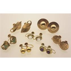 seven pairs of gold earrings All in yellow gold, for non-pierced ears; the lot is comprised of: 9...