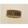 Image 1 : fancy gold band style ring In 18K yellow gold, the 9.2 mm. wide band has a fluted centre section,...