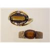 Image 1 : two gold and citrine rings Both rings are in 14K yellow gold. The first is a wrap around design l...