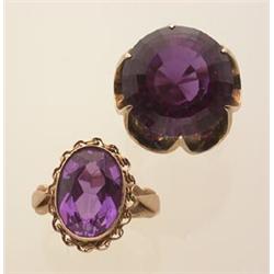 two vintage gold and synthetic alexandrite rings First, in 14K yellow gold, a 17.2 x 10 mm. rou...