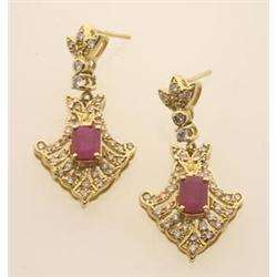 fancy ruby, diamond and gold earrings In 18K yellow gold, with posts for pierced ears; each earri...