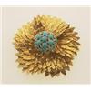 Image 1 : vintage gold and turquoise brooch The brooch is designed as five petals with a textured feather...