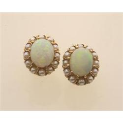 opal and pearl cluster earrings In 14K yellow gold, each earring is designed as a 9.5 x 7.5 mm. o...