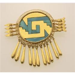 unusual gold and turquoise inlay brooch In 18K yellow gold, the Aztec inspired design is of a wir...