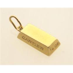 gold bar pendant, signed cartier The pendant is designed as a yellow gold brick, engraved Cartier...