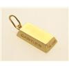 Image 1 : gold bar pendant, signed cartier The pendant is designed as a yellow gold brick, engraved Cartier...