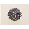 Image 1 : sapphire and gold cluster ring The 18K yellow gold open shouldered mount supports a round cluster...