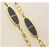 Image 1 : gold and lapis lazuli necklace In 18K yellow gold, six oval stations each with two conforming lap...
