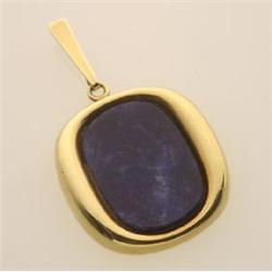gold and SODALITE pendant An 18.7 x 29.8 mm. curved rectangular plaque of sodalite is set within...
