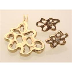 gold pendant and earrings In 10K and 14K yellow gold, the handmade, freeform, open work design pe...
