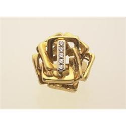 gold and diamond ring, roger Lucas In 18K yellow gold, the freeform design of interconnected rect...