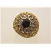 Image 1 : sapphire, diamond and gold ring The pierced, engraved 18K yellow gold domed setting is surmounted...