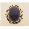 Image 1 : lapis lazuli and gold ring In approximately 18K rose gold, a pierced scalloped edge frame surroun...