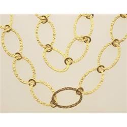 gold necklace In 18K yellow gold, flat textured oval links are joined by polished jump rings and...