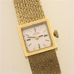 lady's girard Perregaux wrist watch In 18K yellow gold, the textured, woven, integral bracelet is...
