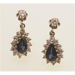 sapphire and diamond cluster drop earrings In 14K white gold, .10 carat diamond solitaires suspen...