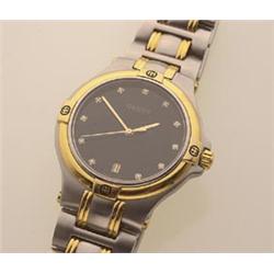 gucci wristwatch The case and bracelet are in stainless with gold accents, with signature detai...
