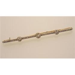 antique bar pin In white topped 18K yellow gold, the straight line bar pin with millegrain detail...