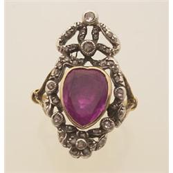 antique ruby and diamond ring In silver-topped gold, the design of a styled bow leading to a garl...