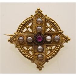 antique gold, ruby and pearl brooch In 18K yellow gold with a Roman finish, the pierced round bro...