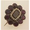 Image 1 : early Victorian garnet and seed pearl sentimental brooch In low karat gold, a frame of ten collet...