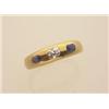 Image 1 : gold, diamond and sapphire band style ring An 18K yellow gold domed band is set with one .20 cara...